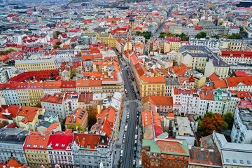 Poster - Prague architecture, aerial view. Historical buildings with red roofs in European city. Birds eye view of cityscape of Praha, Czech Republic