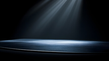 Wall Mural - A dark stage with a spotlight shining on it. The stage is empty and the spotlight is on the floor