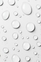 Poster - Close-up of water droplets on a smooth white surface, creating a serene and fresh atmosphere.