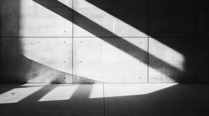 Poster - Abstract interplay of light and shadow on a concrete wall, creating a minimalist aesthetic.