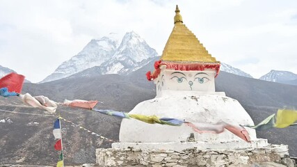 Wall Mural - Footage of an ancient Tibetan Buddhist stupa with beautiful view of Mt.Ama Dablam seen from Dingboche village Nepal.