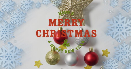 Wall Mural - Image of have a merry christmas and a happy new year text over star, baubles and snowflakes