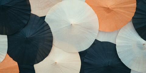Aufkleber - Textured arrangement of colorful paper umbrellas showcasing a vibrant design in a decorative display