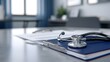 © Tanakrit - A close-up view of a stethoscope resting on a clipboard with documents in a clinical setting, suggesting a healthcare or medical environment.