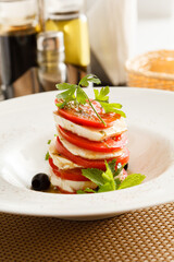 Wall Mural - Caprese Salad on the table