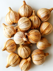 Wall Mural - Heap of dried shallot on white background. Top view.