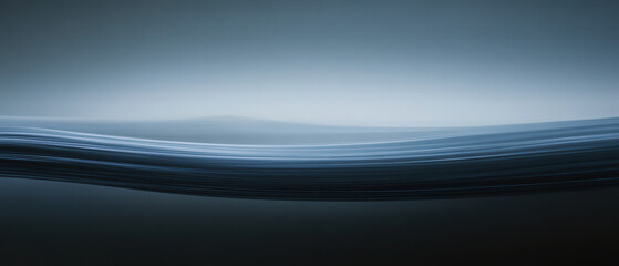 Wall Mural - A blurry image of a wave with a dark background