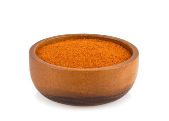 Wall Mural - Paprika powder in the wooden bowl isolated on white background.