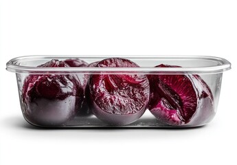 Poster - A container holding several halved, purple plums.
