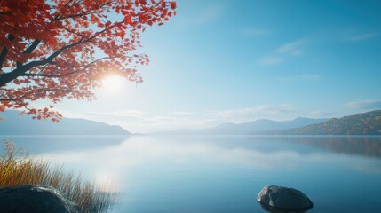 Poster - Serene lake view with autumn foliage and mountains under a clear blue sky.