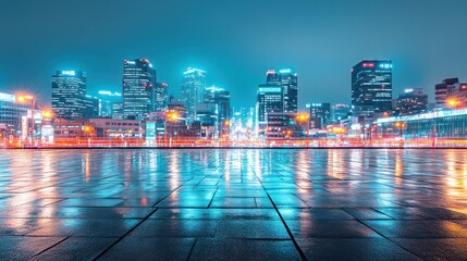 Poster - A vibrant cityscape at night with reflections on wet pavement and illuminated buildings.