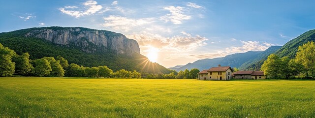 Poster - A serene landscape featuring a house, mountains, and a vibrant sunset over a green field.