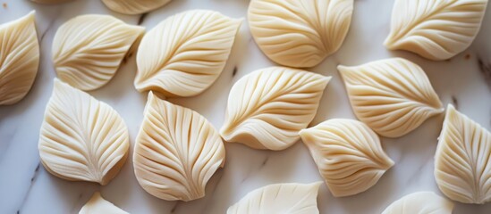 Poster - Protein-based cake decorations shaped like realistic leaves ideal for creative baking and pastry presentations.