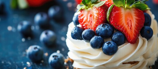Poster - Patriotic dessert with creamy whipped topping and fresh strawberries and blueberries on a dark background