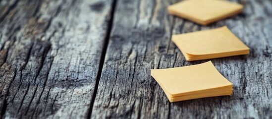 Poster - minimalist empty sticky notes arranged on rustic wooden background symbolizing productivity and orga