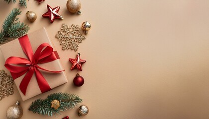 Wall Mural - An elegant Christmas card. Wrapped gifts in kraft paper, red ribbons, surrounded by festive decorations as golden stars, ornaments, snowflake on soft beige background. Space on the left for texts