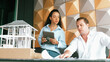 © Summit Art Creations - Professional diversity cooperated engineer team discuss about house material. Project manager shows project plan while explain about building structure. Creative business design concept. Manipulator.