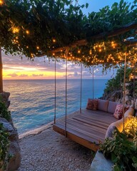 Wall Mural - Seaside swing overlooking ocean at sunset with string lights.