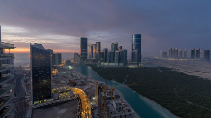 Wall Mural - Buildings on Al Reem island in Abu Dhabi timelapse from above.