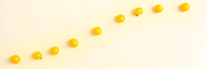 Aufkleber - Yellow cherry tomatoes are arranged in a diagonal pattern on a white background to create a minimalist design._00001_