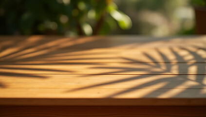 Poster - Wood table features a natural palm leaf shadow texture on its countertop in a warm and moody summer setting._00001_