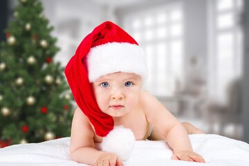 Wall Mural - Cute Santa Claus boy child on background