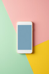 Aufkleber - A white smartphone is placed on a colorful background in a flat, minimalist composition with a clean aesthetic._00002_