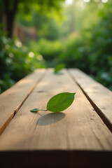Aufkleber - A real wood table features a blurred leaf on a textured wooden surface surrounded by a natural outdoor garden setting._00004_