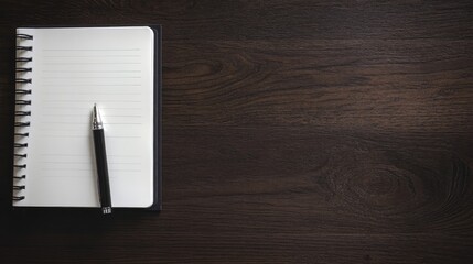 Notebook and Pen on Dark Wood Table for Writing or Note-Taking, Web Banner with Copy Space on Right, Ideal for Education and Business Themes
