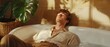 © Mandeep - Man relaxing in a bathtub with sunlight and plants