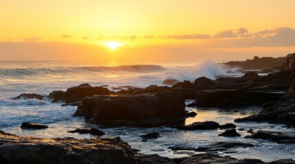 Poster - scenic coastal view during sunset with the sun near the horizon, casting a warm glow over the scene. The rocky shore is partially submerged with waves crashing against the rocks.