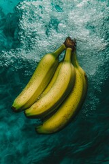 Canvas Print - Underwater shot of ripe yellow bananas with bubbles.