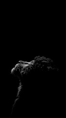 Poster - A dramatic black-and-white image of a lion's head against a dark background.