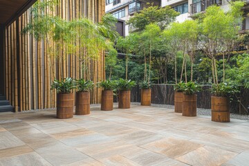 Aufkleber - A serene outdoor space featuring bamboo and potted plants in a modern architectural setting.
