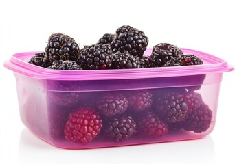 Poster - A container filled with fresh blackberries and raspberries, showcasing vibrant colors.