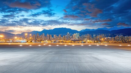 Poster - A scenic view of a city skyline at dusk, with mountains and clouds in the background.