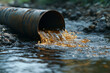 © Martinesku - Sewage pipe discharges sewage and wastewater into the river. Environmental pollution, Hazardous waste water.