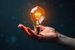 © Galeno - hand holds bright light bulb innovative generative ai