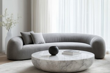 Poster - A plush gray sofa with a stylish round marble table, accented with soft decor, combining modern comfort with artistic flair in a bright and open living space.