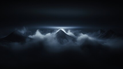 Wall Mural - A mountain range is shrouded in fog and the sky is dark