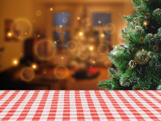 Canvas Print - empty christmas table top with christmas tree in room