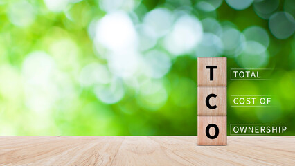 Aufkleber - TCO concept. Total Cost of Ownership text on a wooden block, purchase price of an asset plus the costs of operation, business concept background