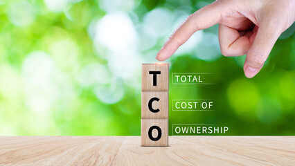 Aufkleber - TCO concept. Total Cost of Ownership text on a wooden block, purchase price of an asset plus the costs of operation, business concept background