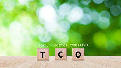 Aufkleber - TCO concept. Total Cost of Ownership text on a wooden block, purchase price of an asset plus the costs of operation, business concept background