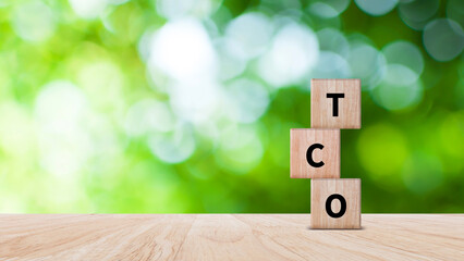 Aufkleber - TCO concept. Total Cost of Ownership text on a wooden block, purchase price of an asset plus the costs of operation, business concept background