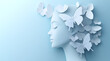 © Anuson - Paper art of a beautiful woman's silhouette with butterflies on a pastel blue background