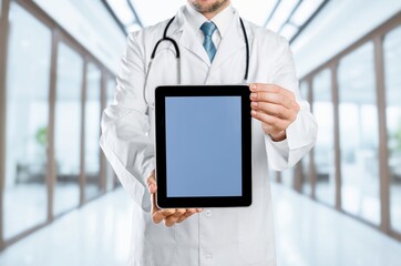 Wall Mural - doctor recommend. hands hold a digital tablet