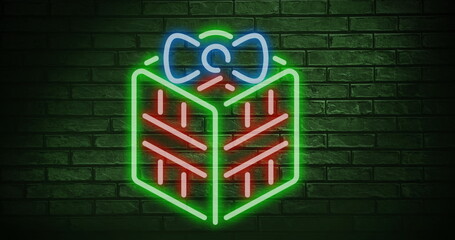 Wall Mural - Christmas gift neon sign against copy space on green brick wall