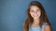 © heinng - Radiant Teen Girl Portrait Against a Blue Background. AI Generated