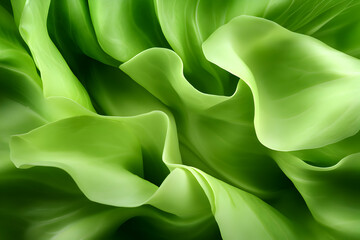 Wall Mural - Close-up of vibrant green leaves with smooth, flowing textures and organic patterns.